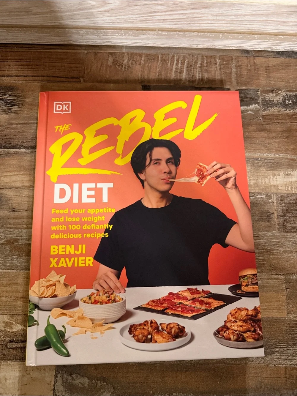 Benji Xavier The Rebel Diet Cookbook - Orange Cover